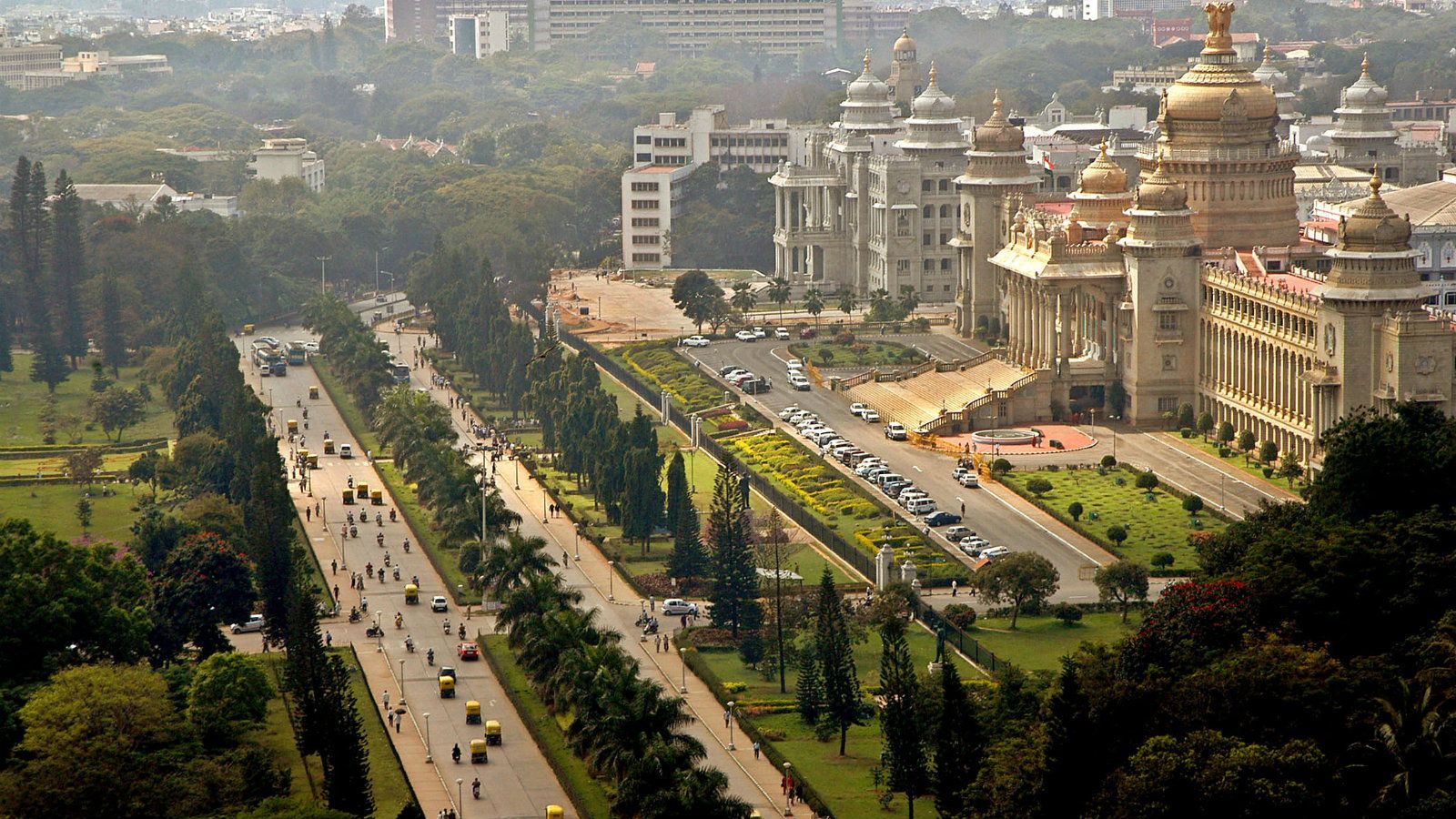 Bangalore1 reuters traffic moves along a road in the southern indian city of bangalore december 14 2005